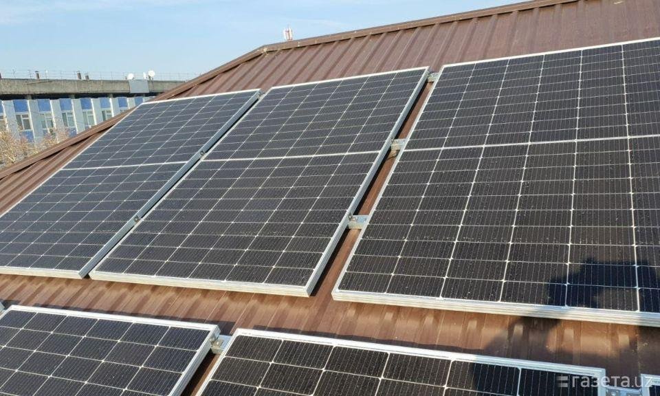 Solar panels installed on a sloping metal roof